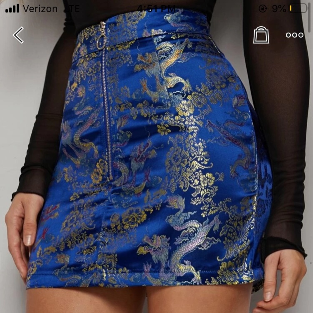 A blue zip up skirt